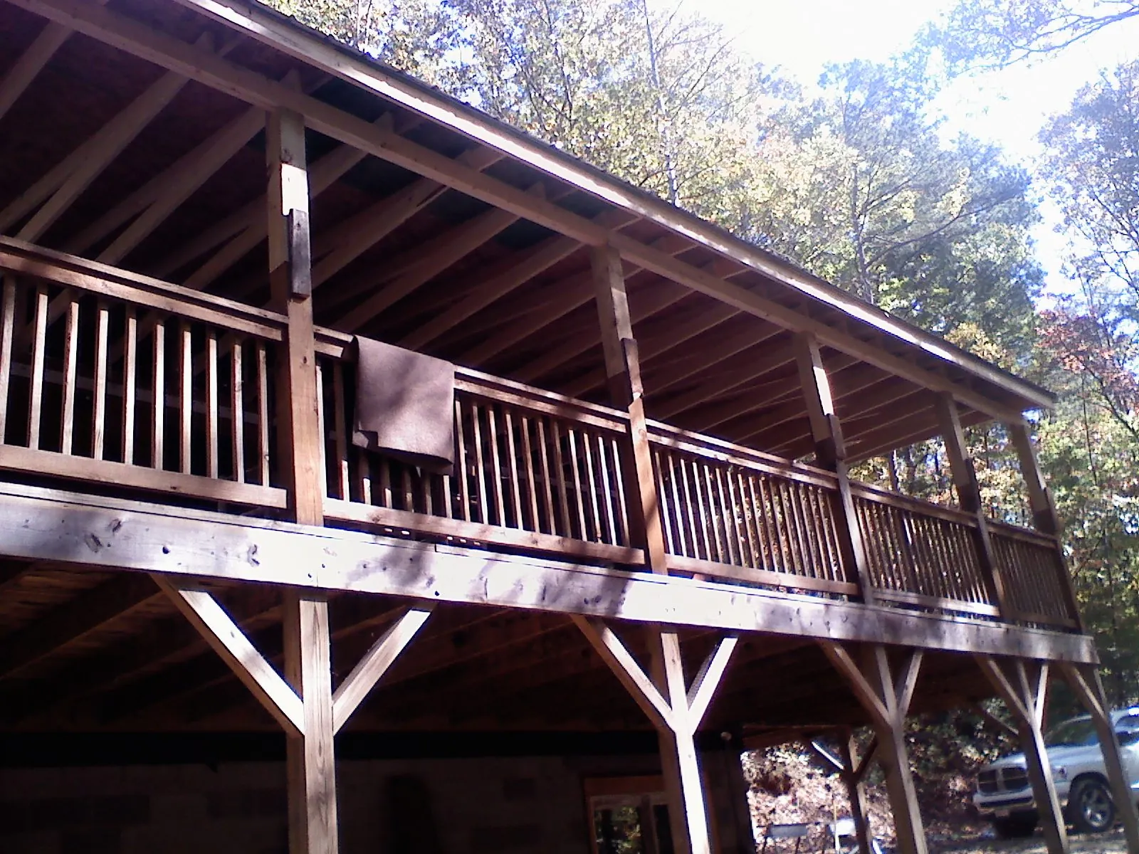 Timber framing under a new elevated porch and deck — Roof Leak Repair in Colliersville by Roofing Brothers